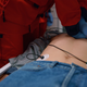 Image for article titled Medic Performing CPR On Dead Guy Puts On Whole Show For Family Watching